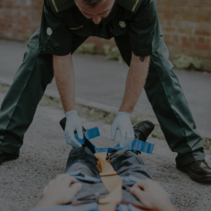 Paramedic dealing with a patient