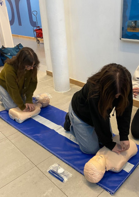annual-update Women practicing CPR on manikins